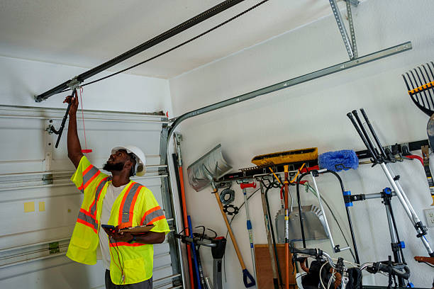 Professional Garage Door Panel Replacement technician working in Aurora, NE